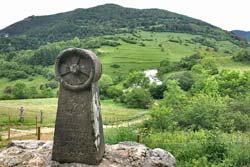 A period-looking stele marking the
