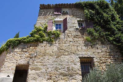 Tall stone house rising from the