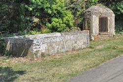 Old covered well and open lavoir
