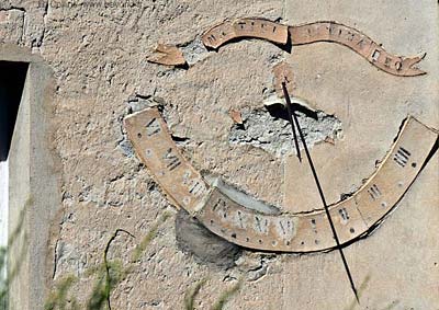 Ancient and weathered sundial on a