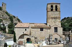 The 11th-century romanesque church above