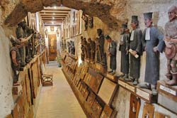 Back hallway of figurines and olive