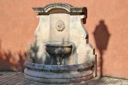 white stone fountain in La Motte photo 