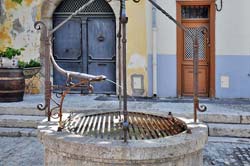 Bronze lizard fountain in the little