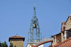 A really ornate campanile on top
