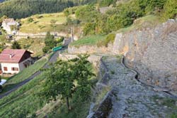 Ancient paved road descending southwest from
